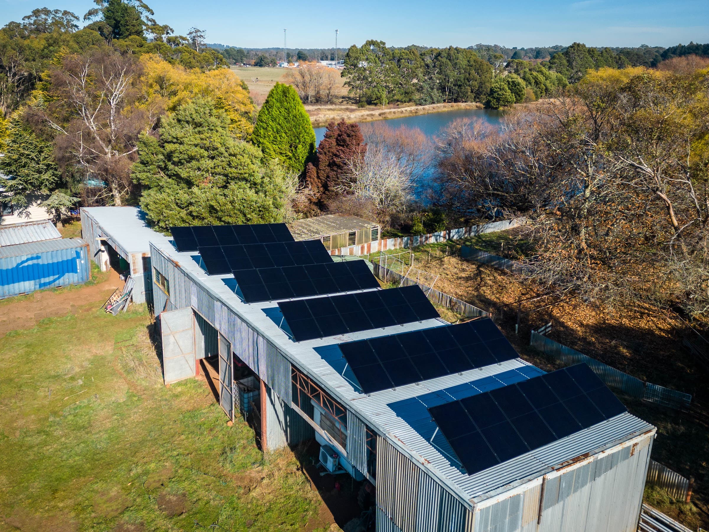 A long solar array on a farm shed in the Central Victorian countryside